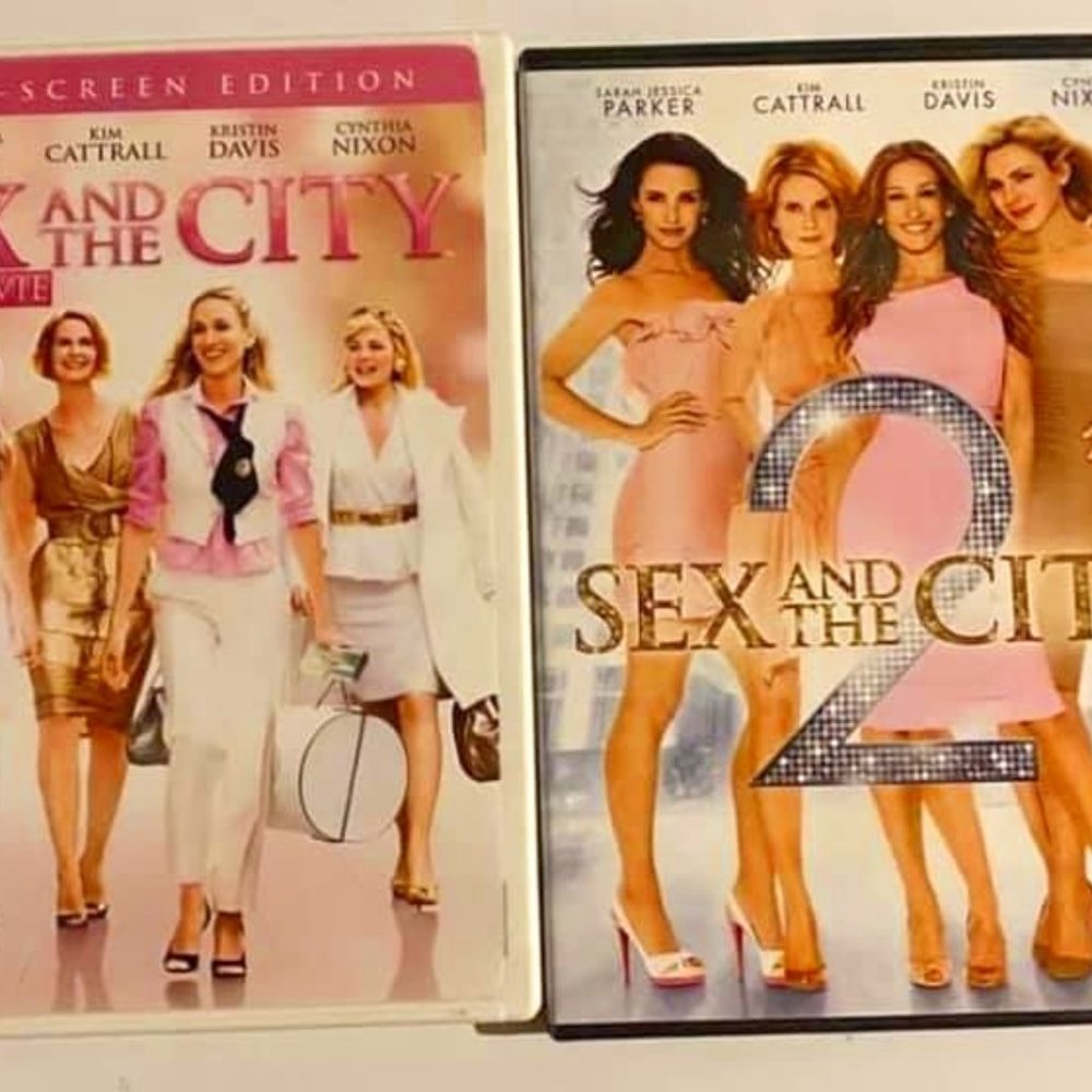 TWO DVDS WITH ONE BEING "SEX AND THE CITY" and "SEX AND THE CITY 2"